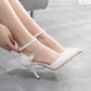 Weißer High Heel-Schuh mit Schleife