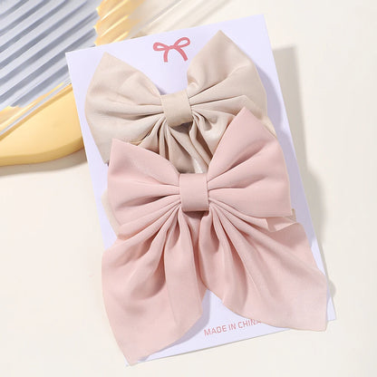 2Pcs / clipes de cabelo de arco clássico Bebé férias