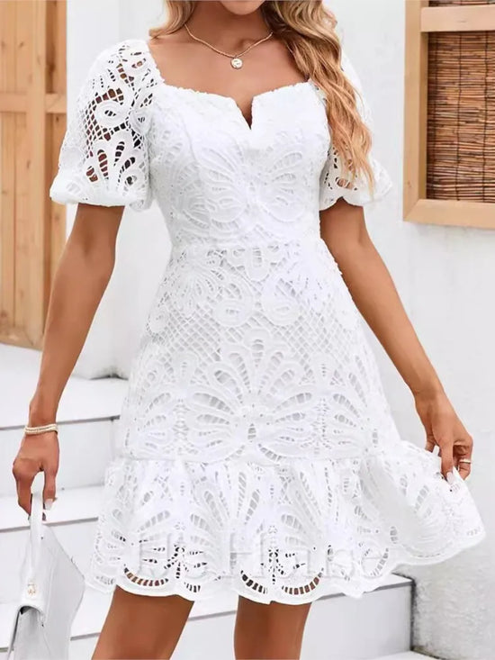Vintage und elegantes weißes Spitzenkleid